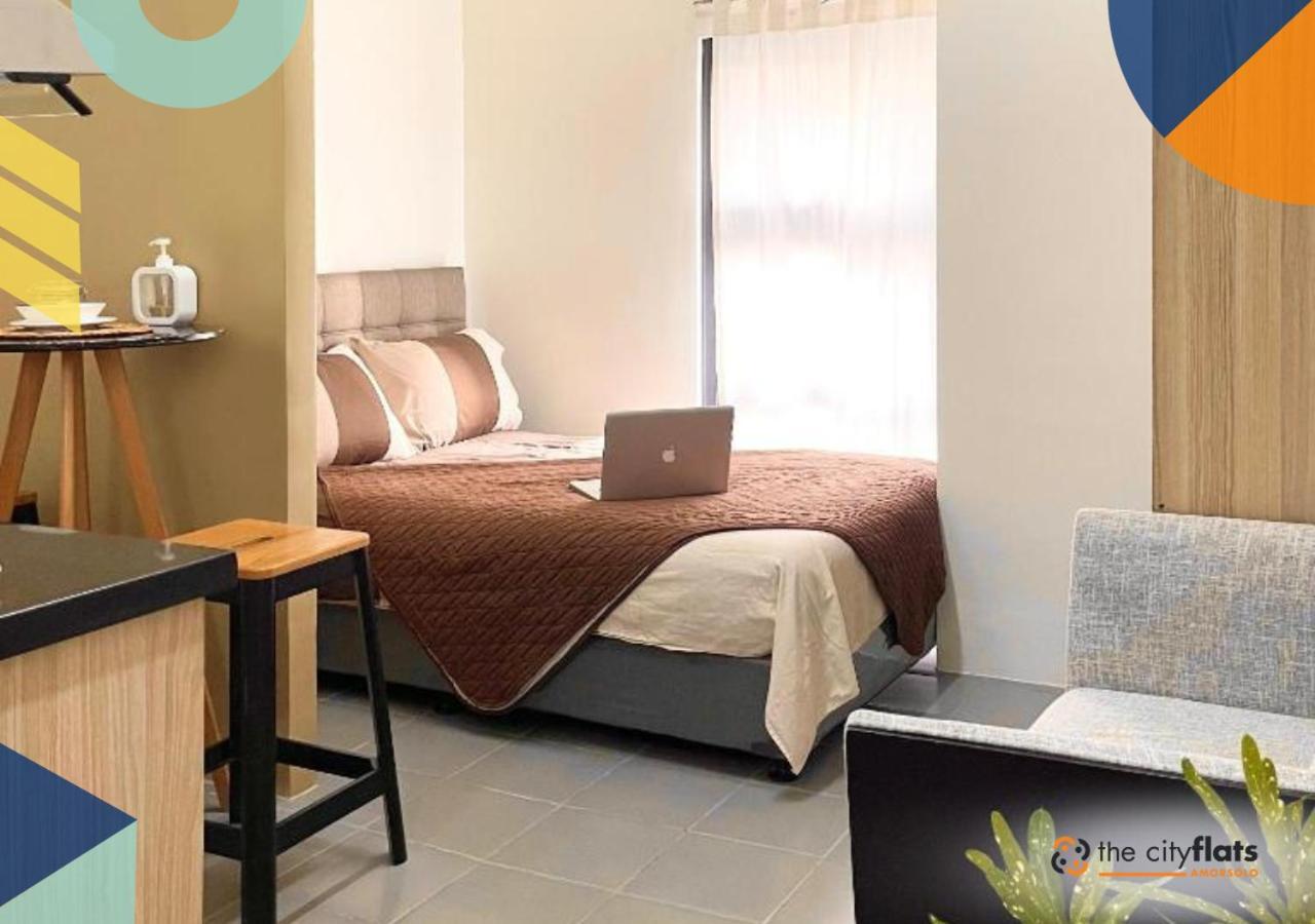 The Flats Amorsolo Hostel *