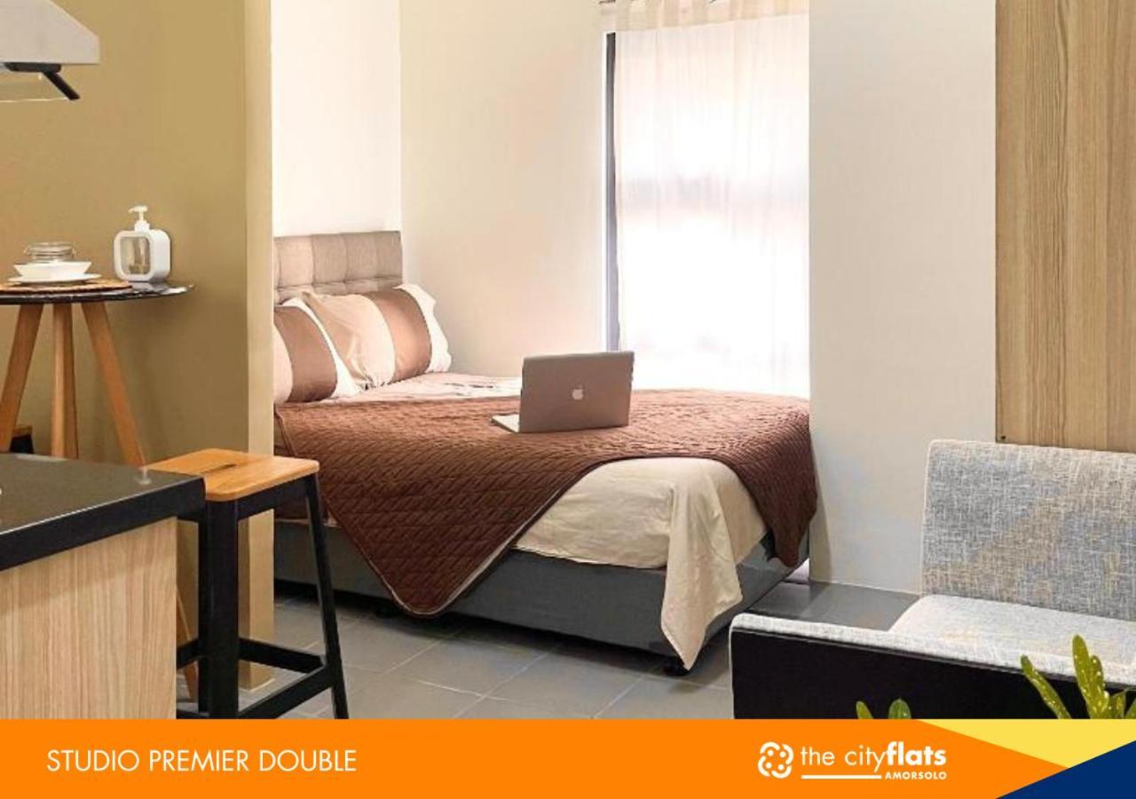 The Flats Amorsolo Hostel